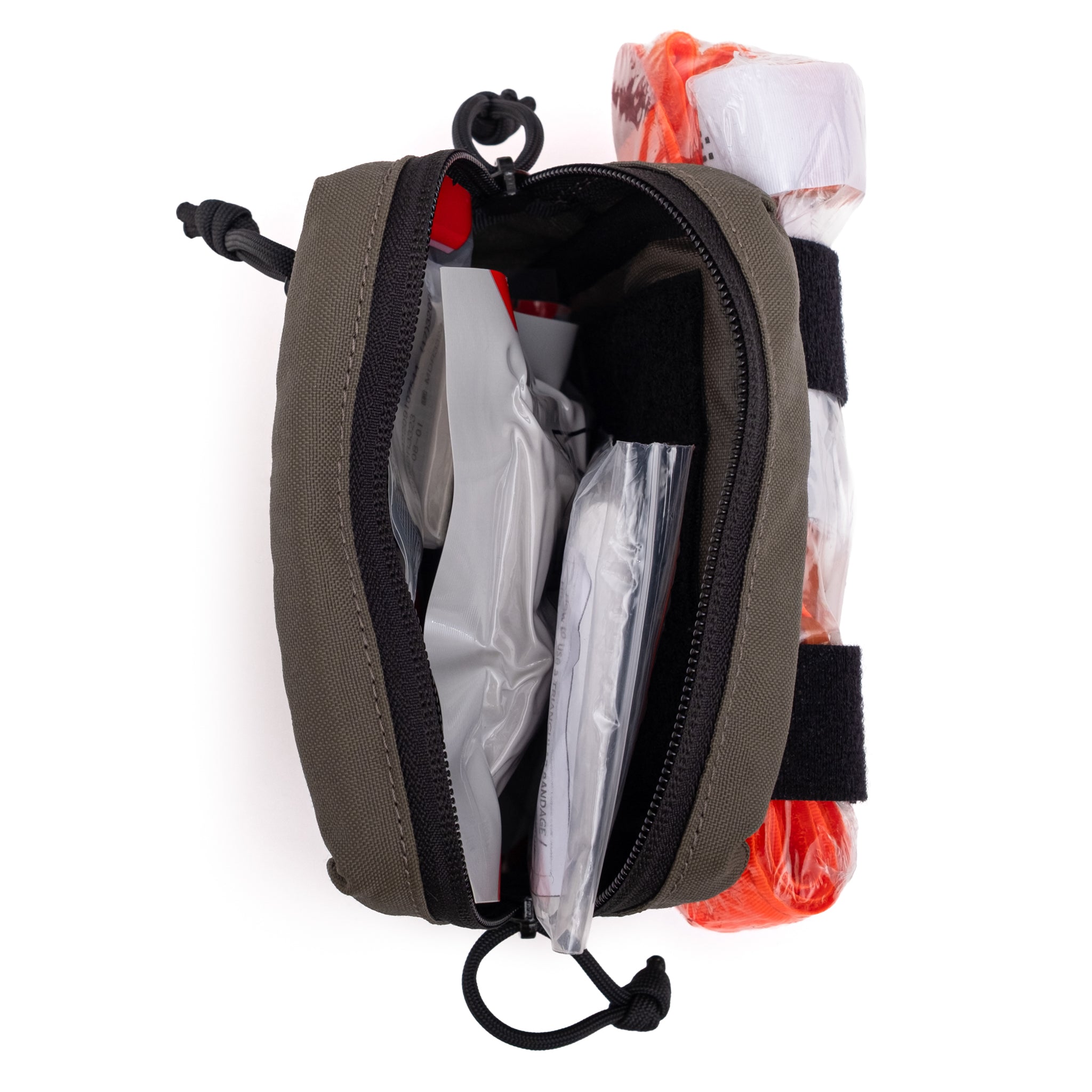 Bleeding Control kit, Open pouch with compartments containing items on a white background